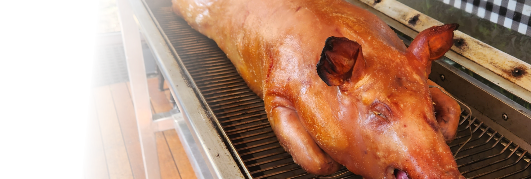 Spit Roasted whole pig prepared by FoodByWayne