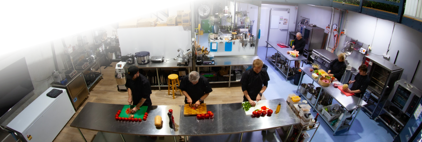 Chef Wayne Elstub preparing gourmet dishes in the kitchen
